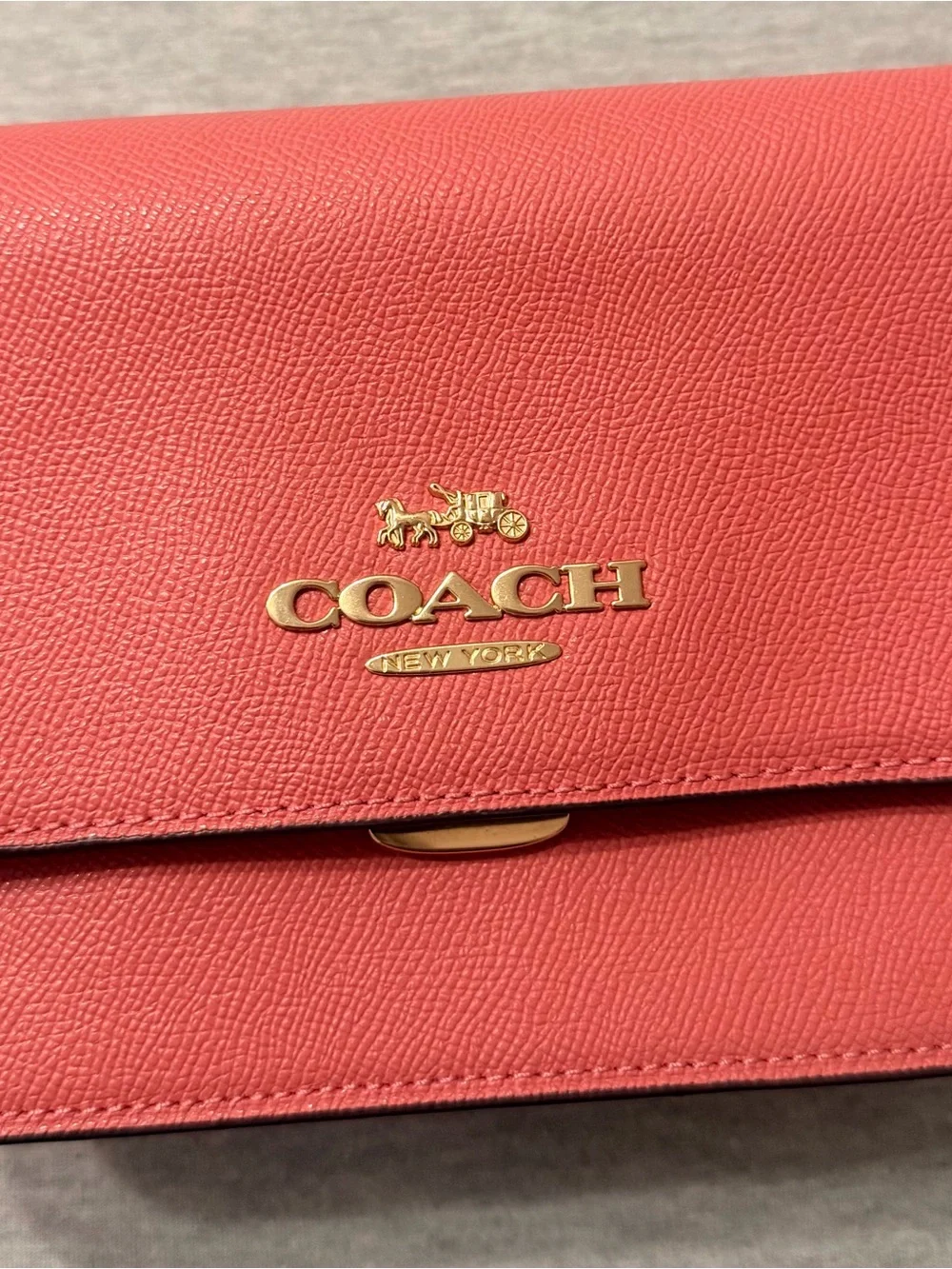 Coach Coral Leather cross body purse with Gold Logo